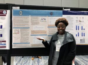 Oluwaseun Adegbite presenting poster