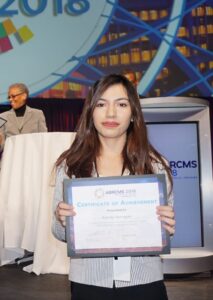 Karina-Barragan-posing-with-certificate